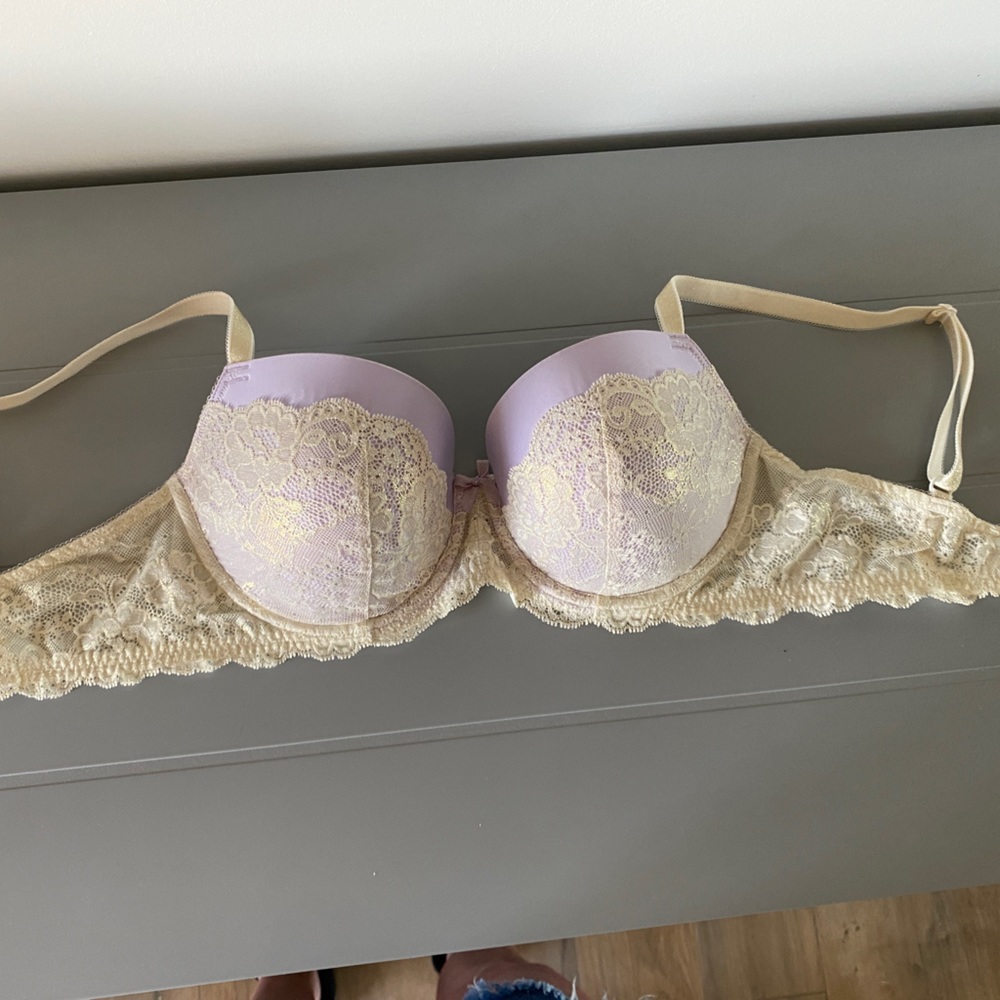Victoria’s Secret 34DD champagne lace over lilac push-up underwire bra.